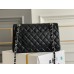 Chanel Classic Flap bag Medium 25 Black with silver hardware, Caviar leather, Hass Factory leather, edge stitching, red interior.