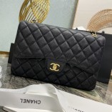 Chanel Classic Flap bag Jumbo 30 Black with gold hardware, Caviar leather, edge stitching, red interior.