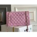 Chanel Classic Flap bag Medium 25 Deep Pink with champagne gold hardware, Caviar leather, Hass Factory leather, seamless.