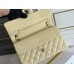 Chanel Classic Flap bag Medium 25 Light Yellow with champagne gold hardware, Caviar leather, Hass Factory leather, seamless.