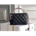Chanel Vanity Makeup pouch 23A Black with pink interior, handle, Camellia adjustable buckle, lambskin, 17x10x8cm.